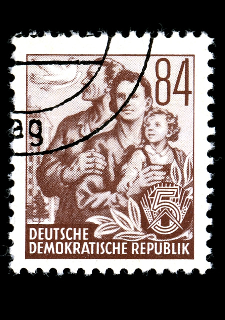 Hochhaus an der Weberwiese appearing in the background of a GDR postage stamp