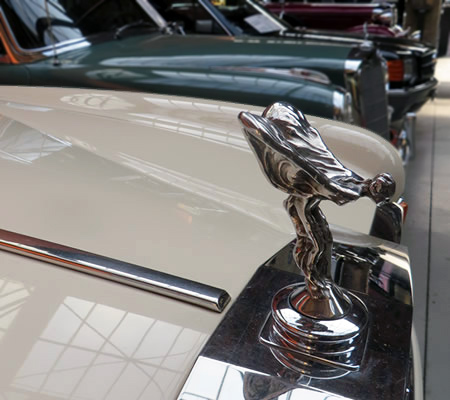 A line-up of gleaming automobiles at Berlin's Classic Remise car maintenance, garaging and showroom centre