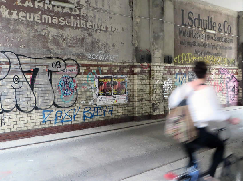 Discovering Berlin's hip bars and nightlife - in a beautiful old courtyard complete with ancient signage. Gerichtstraße, Wedding