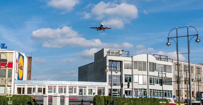 Planes coming in to land above Kurt Schumacher Platz, Berlin