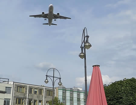 Dodging planesin a Berlin square