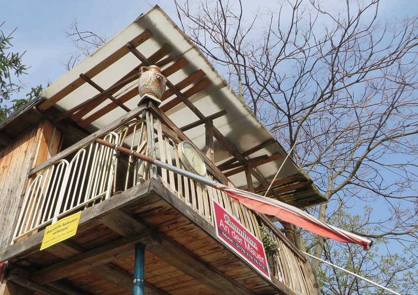 View of Berlin's first 'guerilla garden' and home made out of recycled materials: the Baumhaus an der Mauer, Berlin