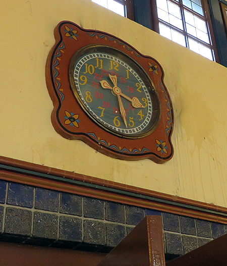 Folk art - painted clock in Dahlem-Dorf Metro station , Berlin