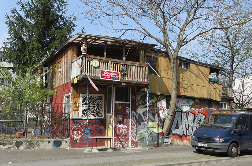 Baumhaus and der Mauer seen from the road. Berlin